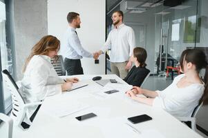 Business people working on project in office photo