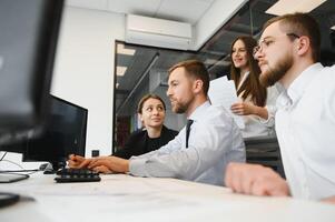 Group of young people in business meeting photo