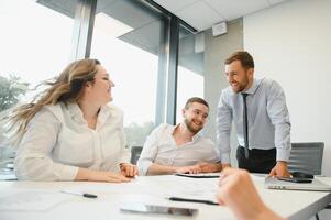 Business people working on project in office photo