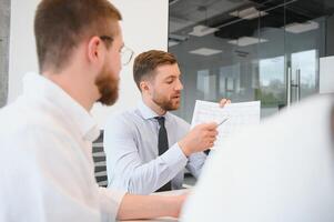 Group of young people in business meeting photo