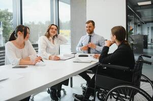 Group of young people in business meeting photo