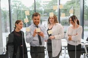 A group of business people partners during a set team meeting in the modern office. Teamwork concept photo