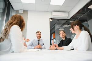 Business people working on project in office photo