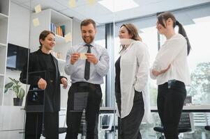 Group of young people in business meeting photo