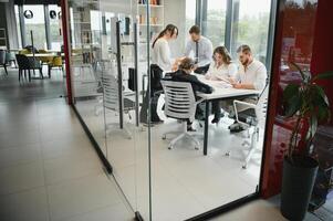 Group of young people in business meeting photo