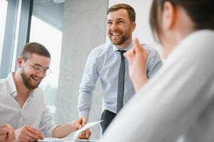 Corporate business team and in a meeting at modern office with big windows . High quality photo