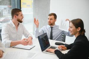 Business people working on project in office photo