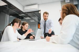 Corporate business team and in a meeting at modern office with big windows . High quality photo