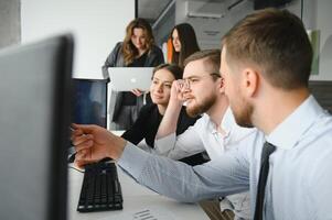 Business people working on project in office photo