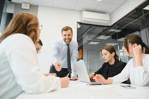 Group of young people in business meeting photo