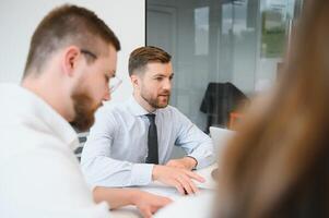 Corporate business team and in a meeting at modern office with big windows . High quality photo