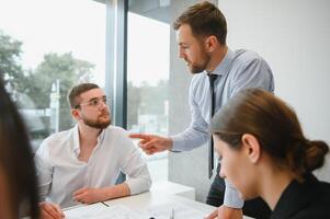 Business people working on project in office photo