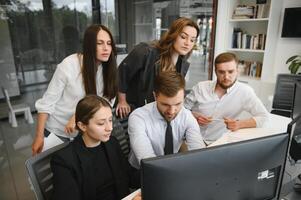 Business people working on project in office photo