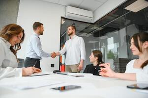 Corporate business team and in a meeting at modern office with big windows . High quality photo