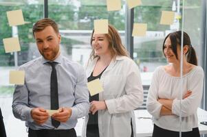 Business people working on project in office photo