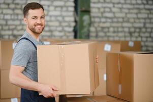 Male warehouse worker portrait in warehouse storage. photo