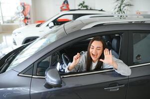 woman customer female buyer client chooses auto. Sales concept photo