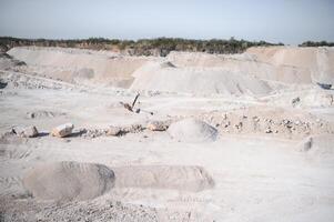 sand quarry, in the photo, a quarry for the extraction of sand against a blue sky photo