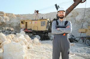 Quarry worker doing a quality check photo