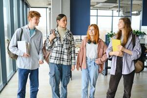 Happy high school students in the classroom photo