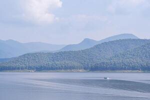 Relax and enjoy the beautiful scenery at the Mae Ngat Dam and Reservoir is part of the Sri Lanna National Park, Chiang Mai, Thailand. Holiday and Travel concept photo