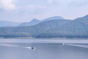 The scenic view of Mae Ngat Dam and reservoir are part of the Sri Lanna National Park, Chiang Mai, Thailand. Holiday and Travel concept photo