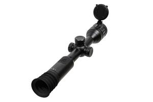 Modern sniper scope on a white background. Optical device for aiming and shooting at long distances. Sight with built-in thermal imager. Isolate on a white back photo