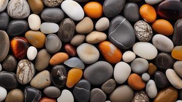 Multi-colored pebbles. Colored round pebbles lying tightly next to each other. Dark back photo