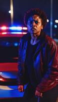 photo of portrait close up view of criminal suspect in crime scene standing in front of police car at night and red blue light,