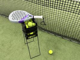 Paddle tennis racket and ball photo