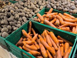 A close up of many different fruits and vegetables photo