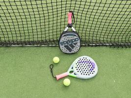 Kyiv, Ukraine, May 15, 2024 paddle tennis racket and balls, padel game kit photo