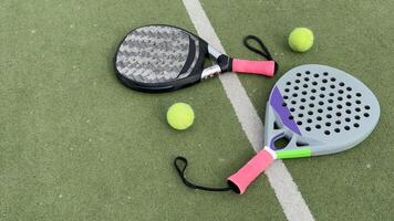 paddle rackets on the playing court photo