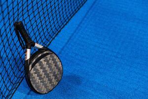 Paddle tennis objects and court. photo