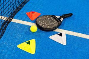 Paddle tennis objects and court. photo