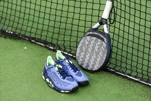 Paddle tennis and artificial grass, close up image photo