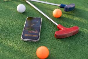 mini golf sports betting on a smartphone photo