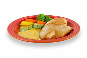 grilled chicken with vegetables and cassava puree photo