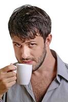 young man with beard in different situations on neutral background photo