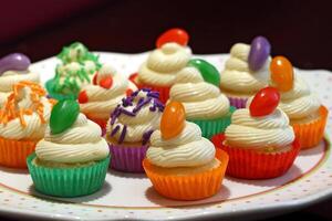 vanilla cupcakes with vanilla cream and jelly bean candy photo