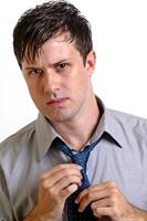 young man with beard in different situations on neutral background photo