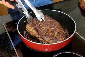 step by step preparation of picanha, a Brazilian cut of meat photo