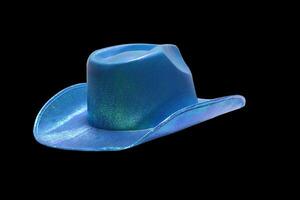 vibrant blue cowboy hat on black background photo