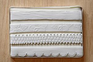 texture models and piping work for wedding cake decoration photo