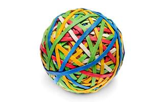 ball made of colorful rubber bands on white background photo