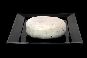 cabra queso con membrillo, delicioso brasileño queso en negro antecedentes foto