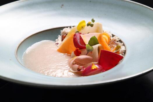 cold cocoa soup with pickles, honey and cocoa nibs photo