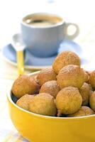 dumplings of rain, typical Brazilian snack with dough and sugar with cinnamon powder photo