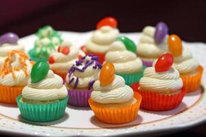 vanilla cupcakes with vanilla cream and jelly bean candy photo