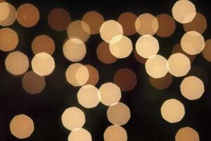 colorful and defocused lights on black background photo